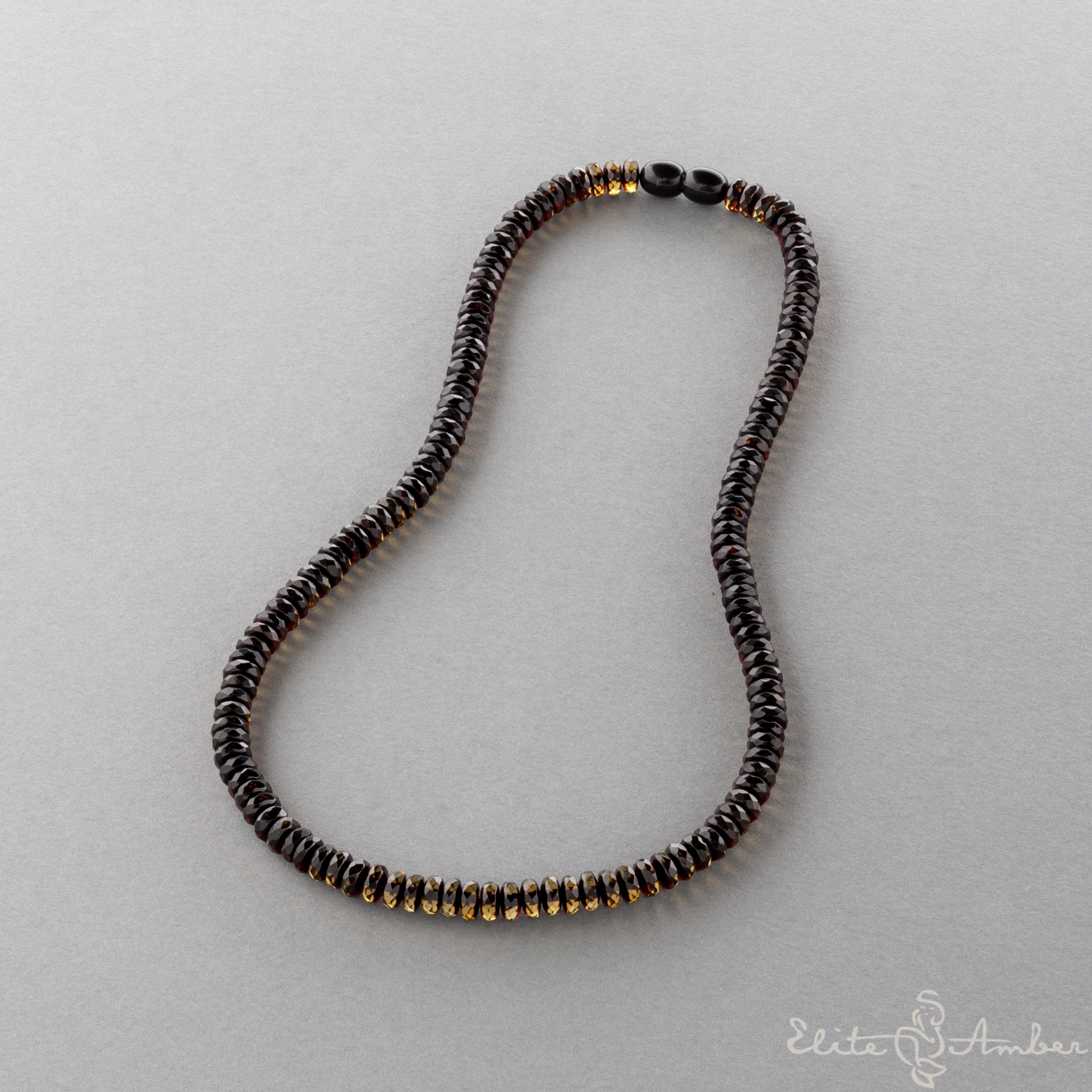 Amber necklace "Glossy black moon"