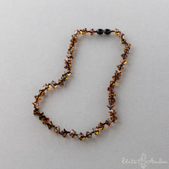 Amber necklace "Glossy black star"