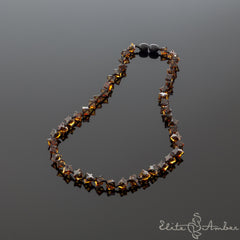 Amber necklace "Glossy black star"