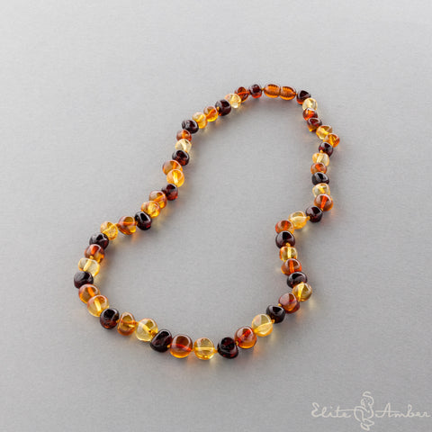 Amber necklace "Three color baroque"
