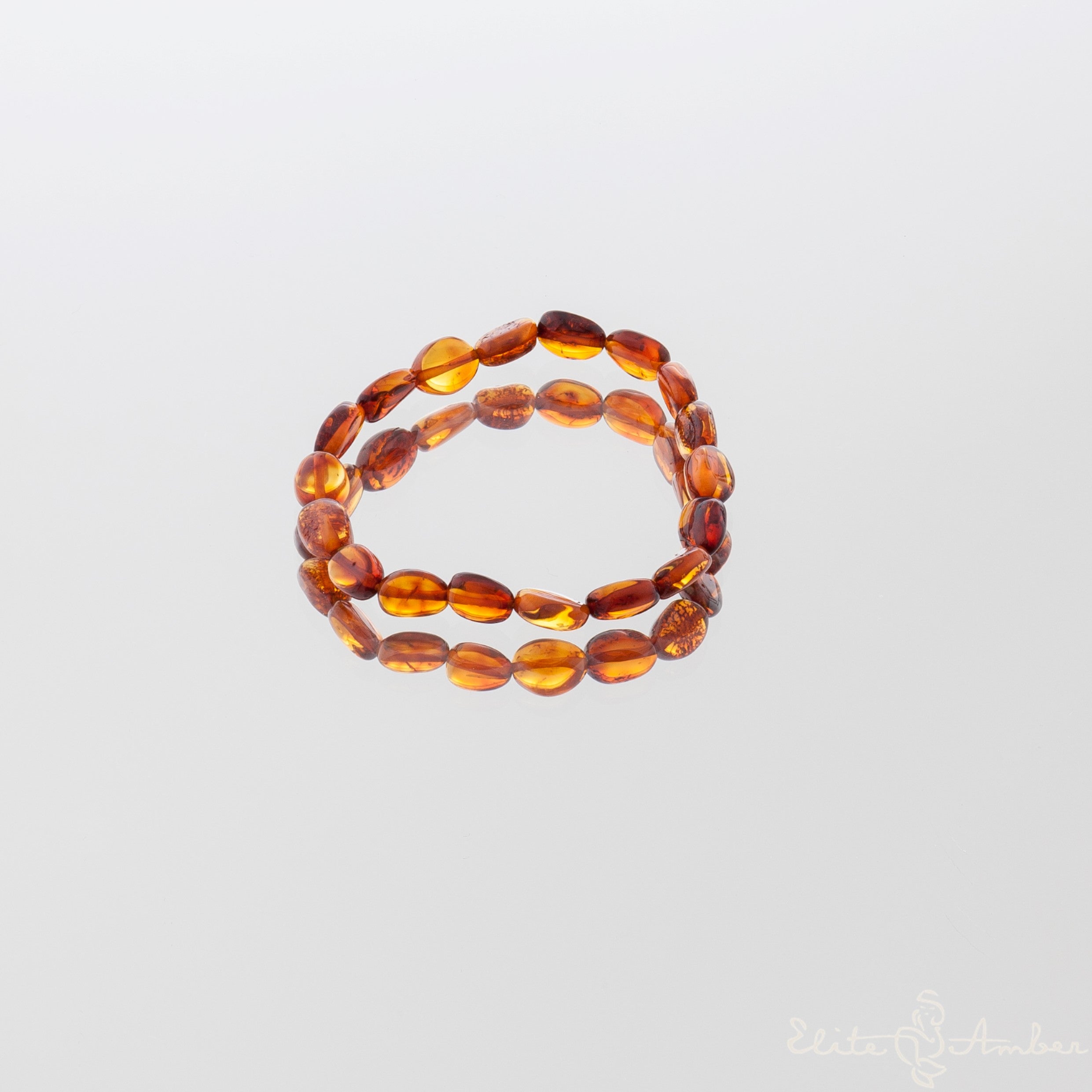 Polished amber pebbles bracelet