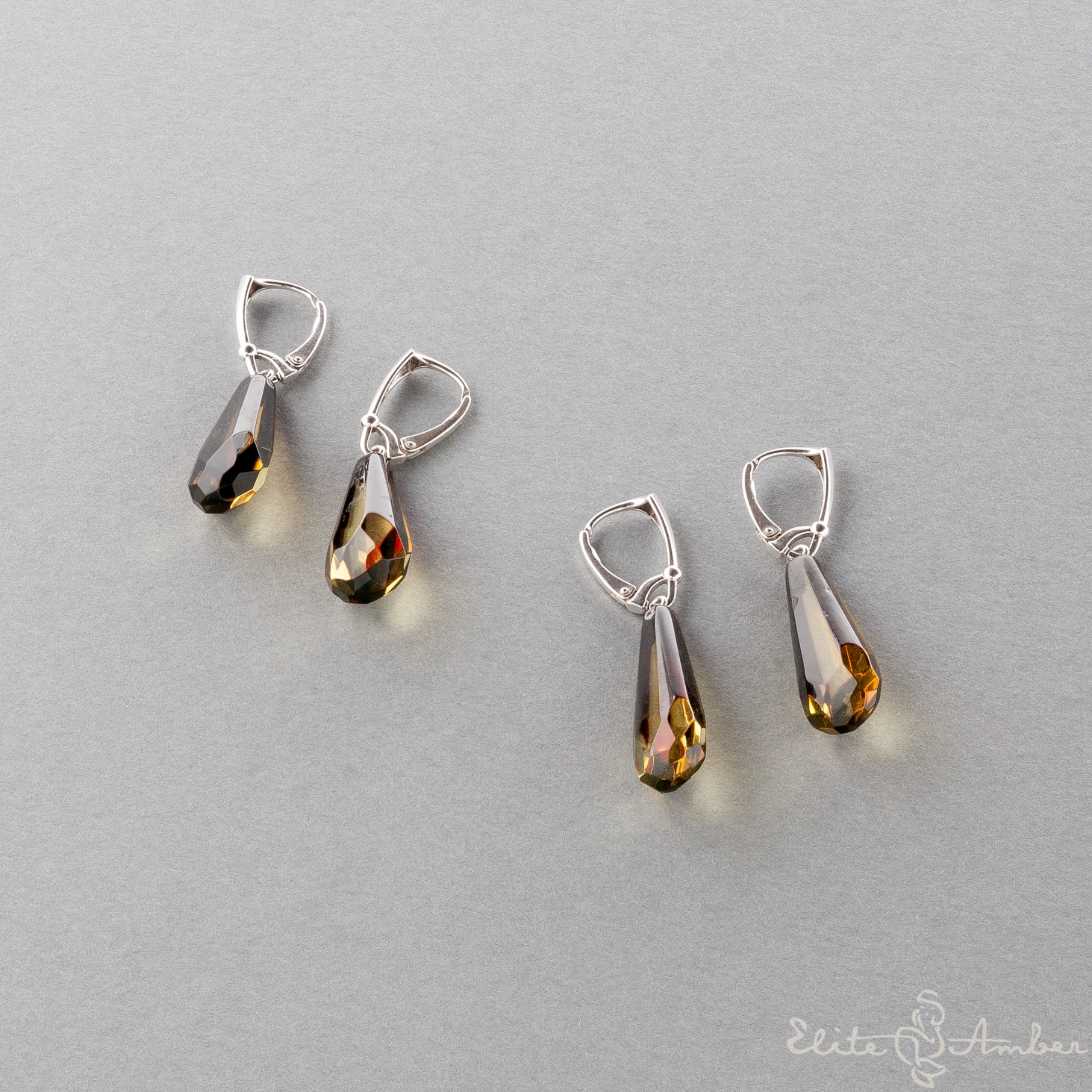 Amber earrings "Greenish droplets"