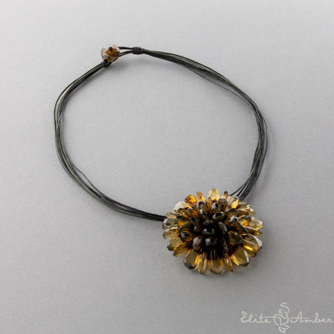 Amber brooch-pendant "Black flower"