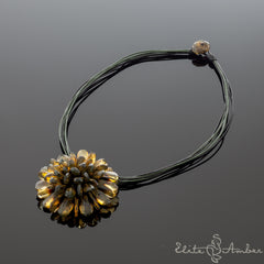 Amber brooch-pendant "Black flower"