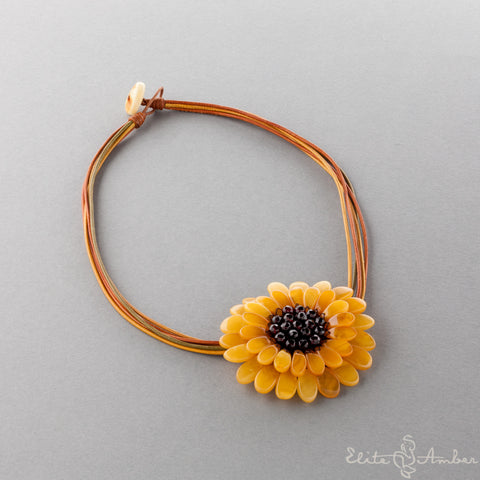 Amber brooch-pendant "Sunflower"