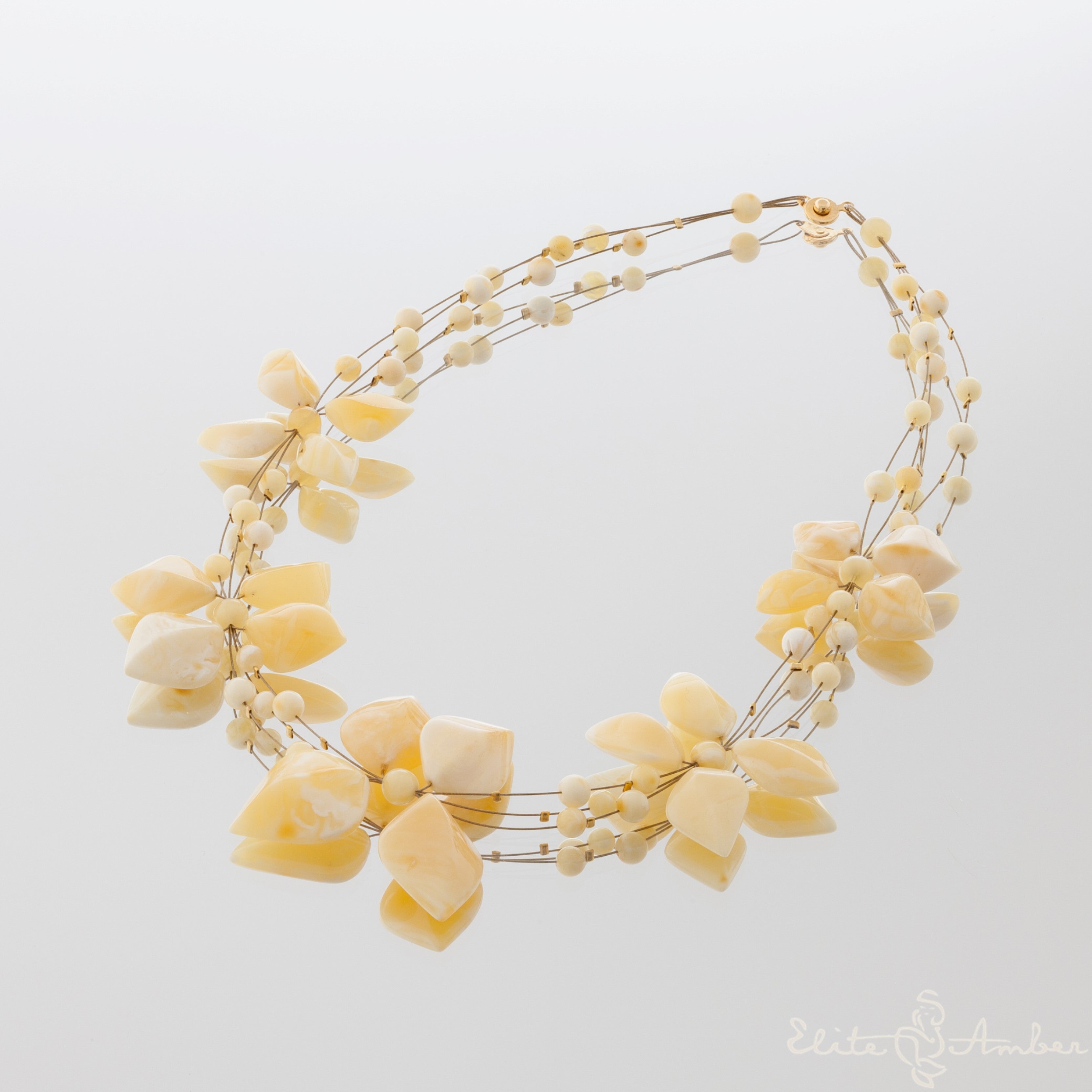 Amber necklace "Brilliant royal flowers"
