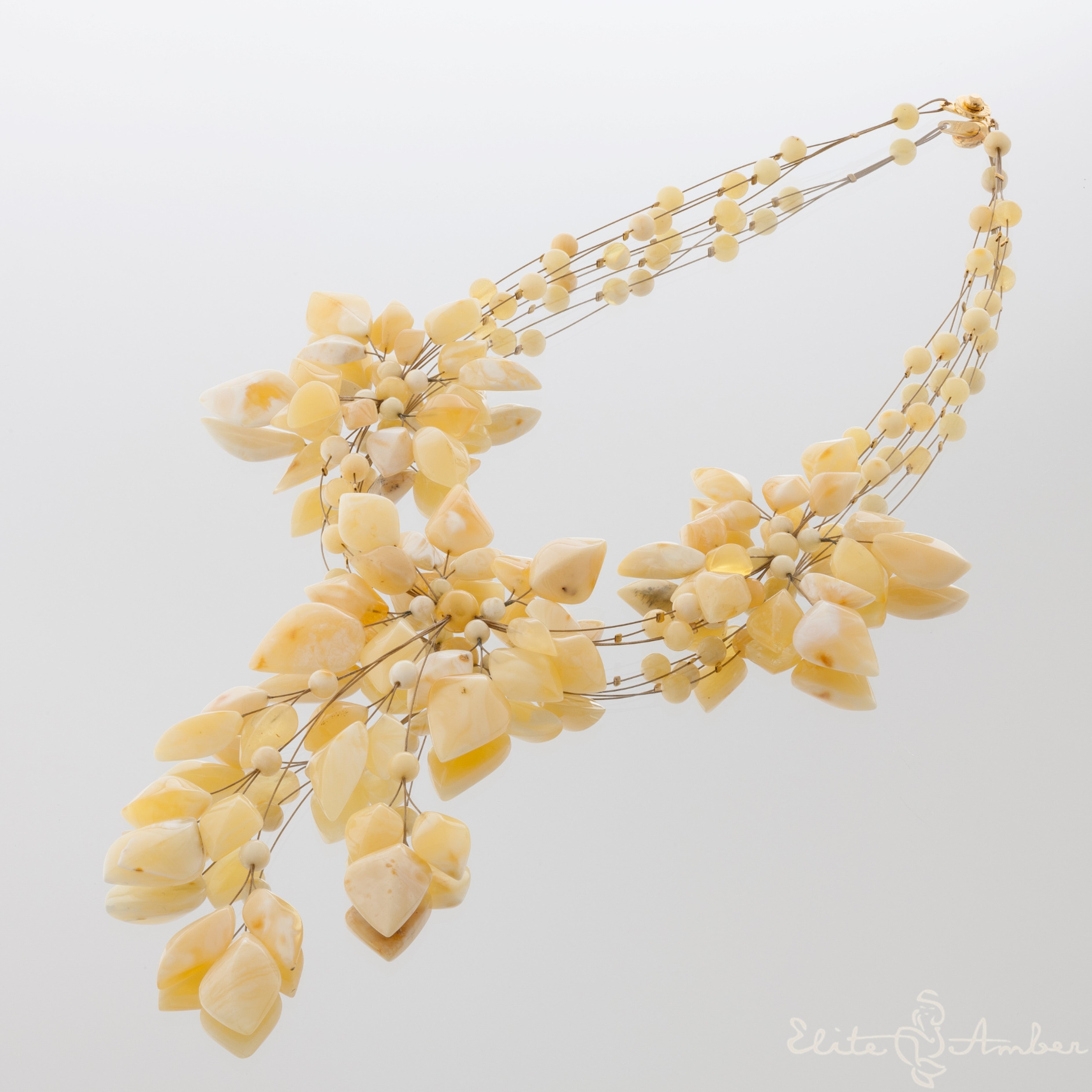 Amber necklace "White royal flowers"